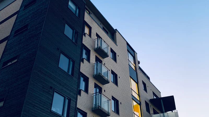 Modern apartment building photographed at dusk