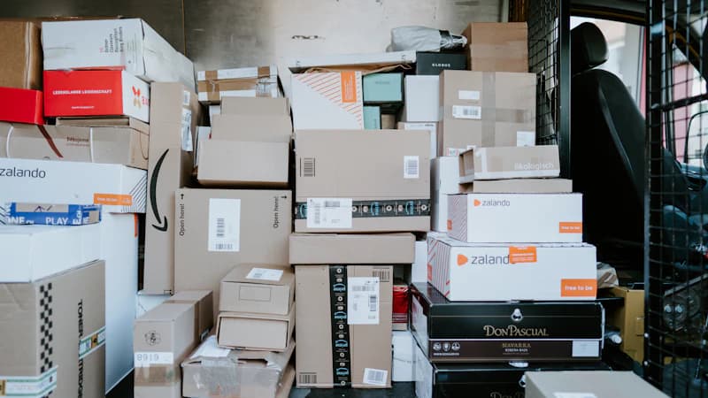 Cardboard shipping boxes stacked on a crate